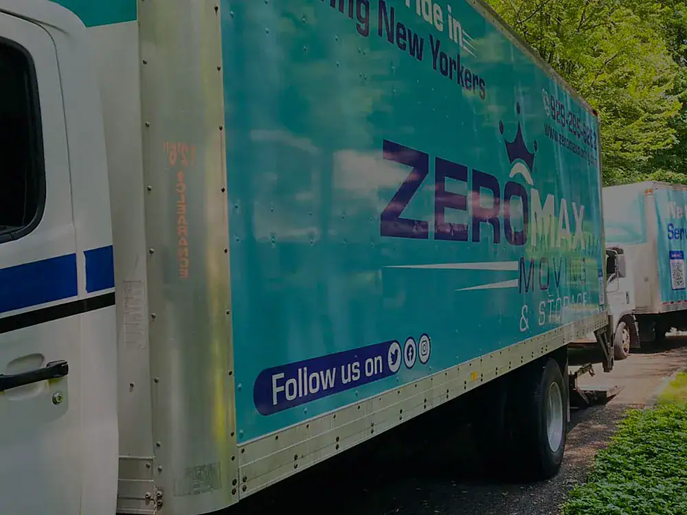 ZeroMax moving truck parked on a tree-lined street for a move from NYC to Columbus