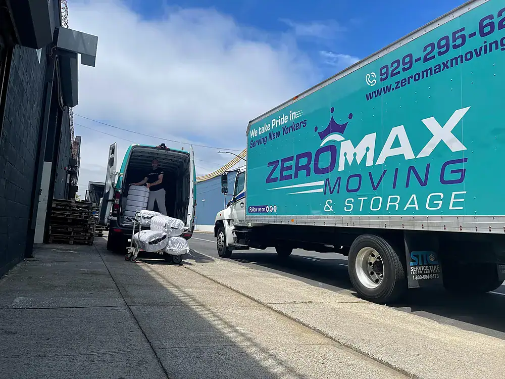 ZeroMax moving truck being loaded at the curb for a move from NYC to Jacksonville