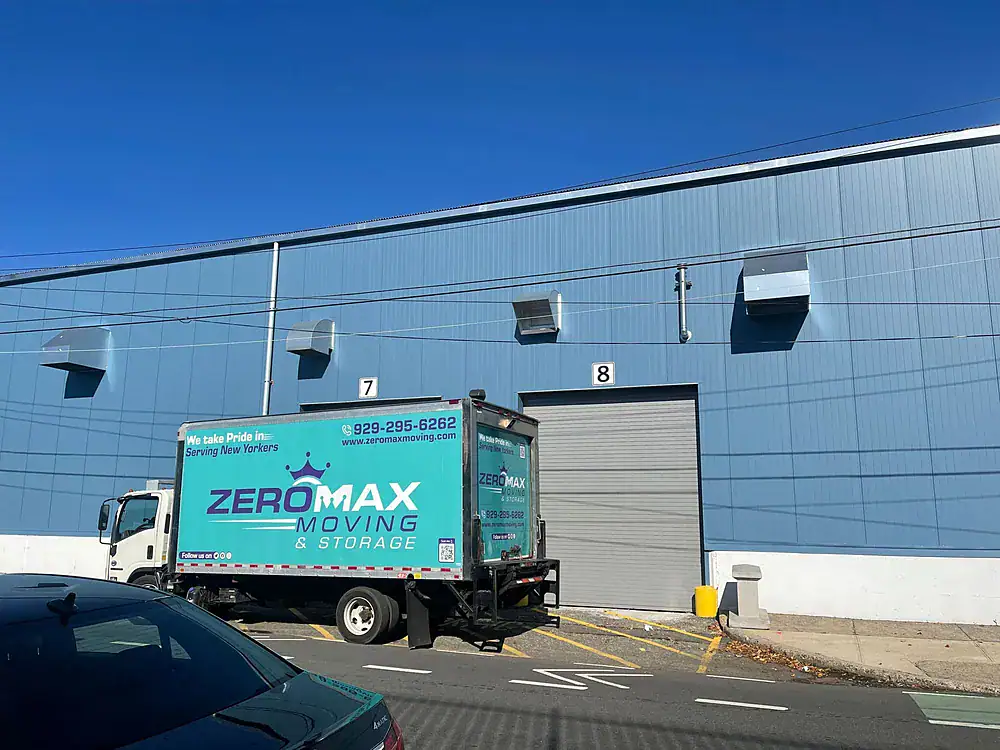 ZeroMax moving truck at a warehouse loading dock for a move from NYC to Milwaukee