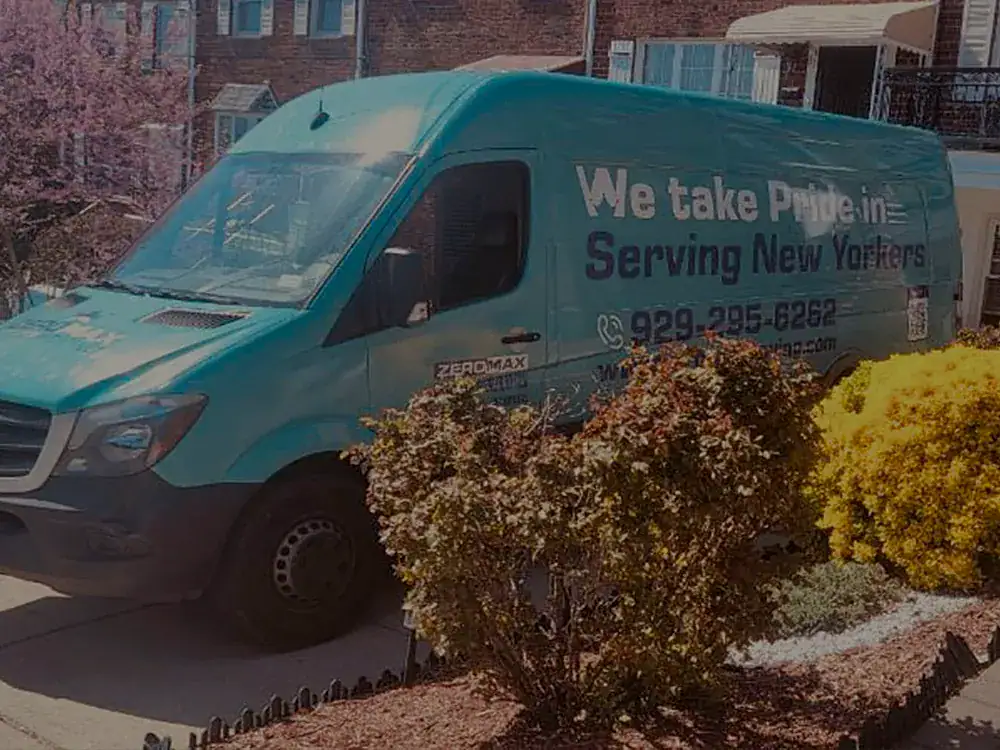 ZeroMax moving van parked outside a home for a move from NYC to Raleigh