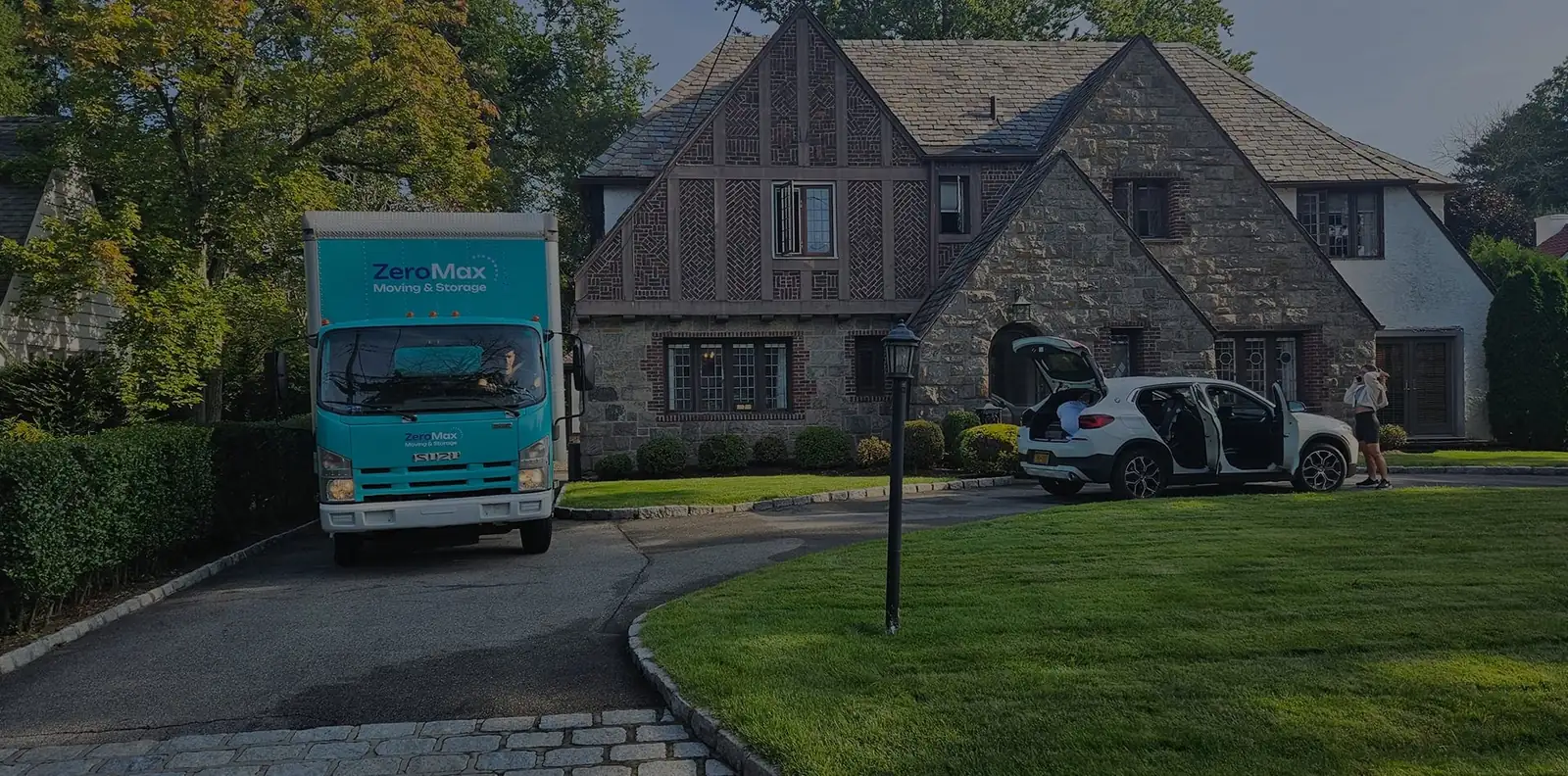 ZeroMax Moving and Storage truck outside a home in New York